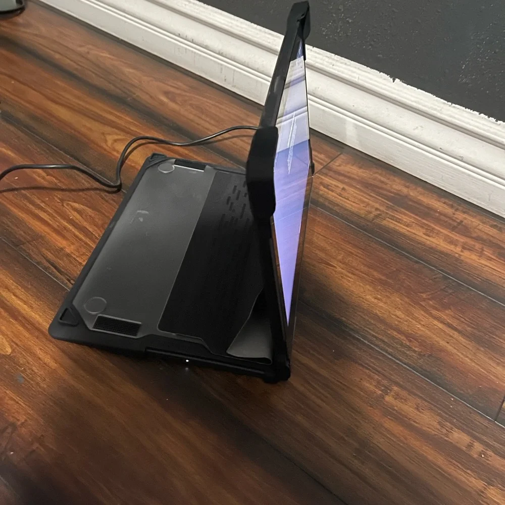 Brand NEW with a Brand NEW CASE TOUCHSCREEN and is adjustable 2-1 laptop/tablet.